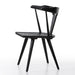 Black wooden chair on a white background. Side Ripley Dining Chair in Black Oak with mid-century Windsor-style sculptural silhouette.