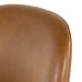 Close-up of brown upholstered arched backrest with smooth seam detail.