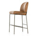 Brown bar stool with padded seat and arched back, black metal legs and footrest.