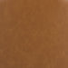 Close-up of brown upholstered bar stool fabric with fine texture.