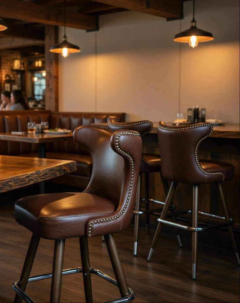 Silverado bar stool showcasing a graceful reimagined cowboy silhouette and clean performance upholstery for hospitality use