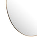 Sleek edge close-up of the Georgina mirror's slender polished brass frame showing the refined modern edge and spacious mirror finish