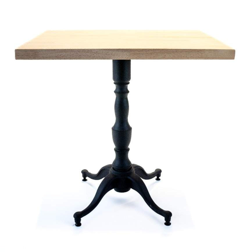Small wooden table with a black metal base on a white background