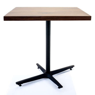 Square table with wooden top and black metal base on a white background