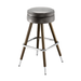 Stone upholstered bar stool with brass-toned legs and chrome footrest