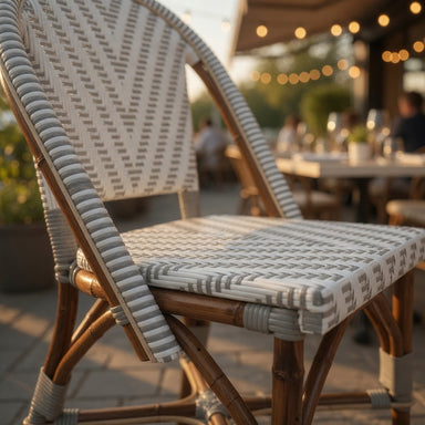 Nautilus side chair seat detail with gray-and-white woven pattern and wood frame