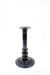 Black cast table base with round pedestal, decorative scroll details, and top mount plate