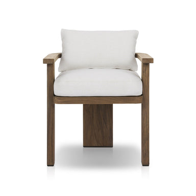 Tahana Outdoor Dining Armchair with three-leg wood frame and Alessi Linen cushions