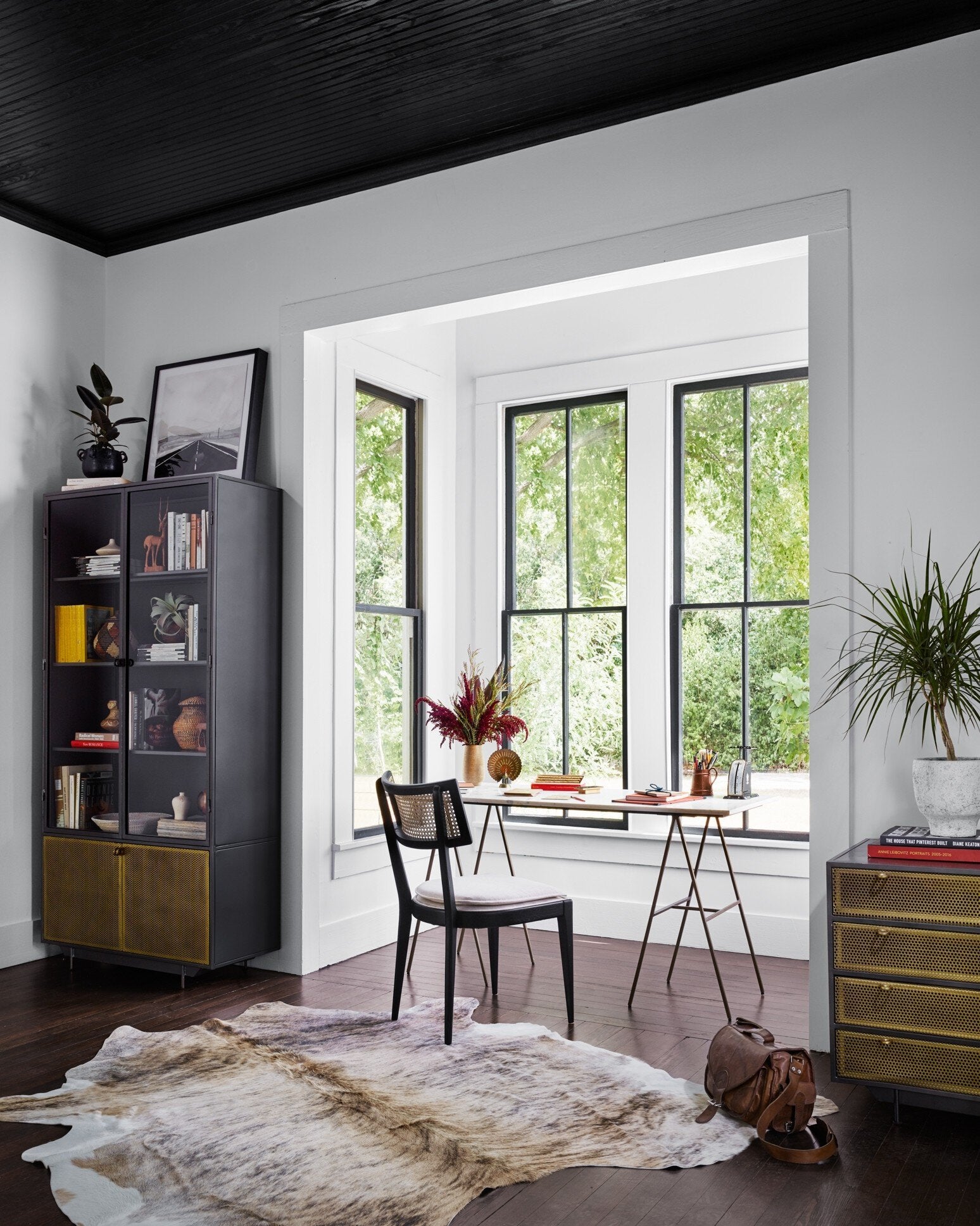 Visual scene Britt Dining Chair in Cambric Ivory performance fabric with black parawood tapered legs