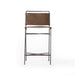Wharton Counter Stool featuring Distressed Brown faux leather and industrial steel legs