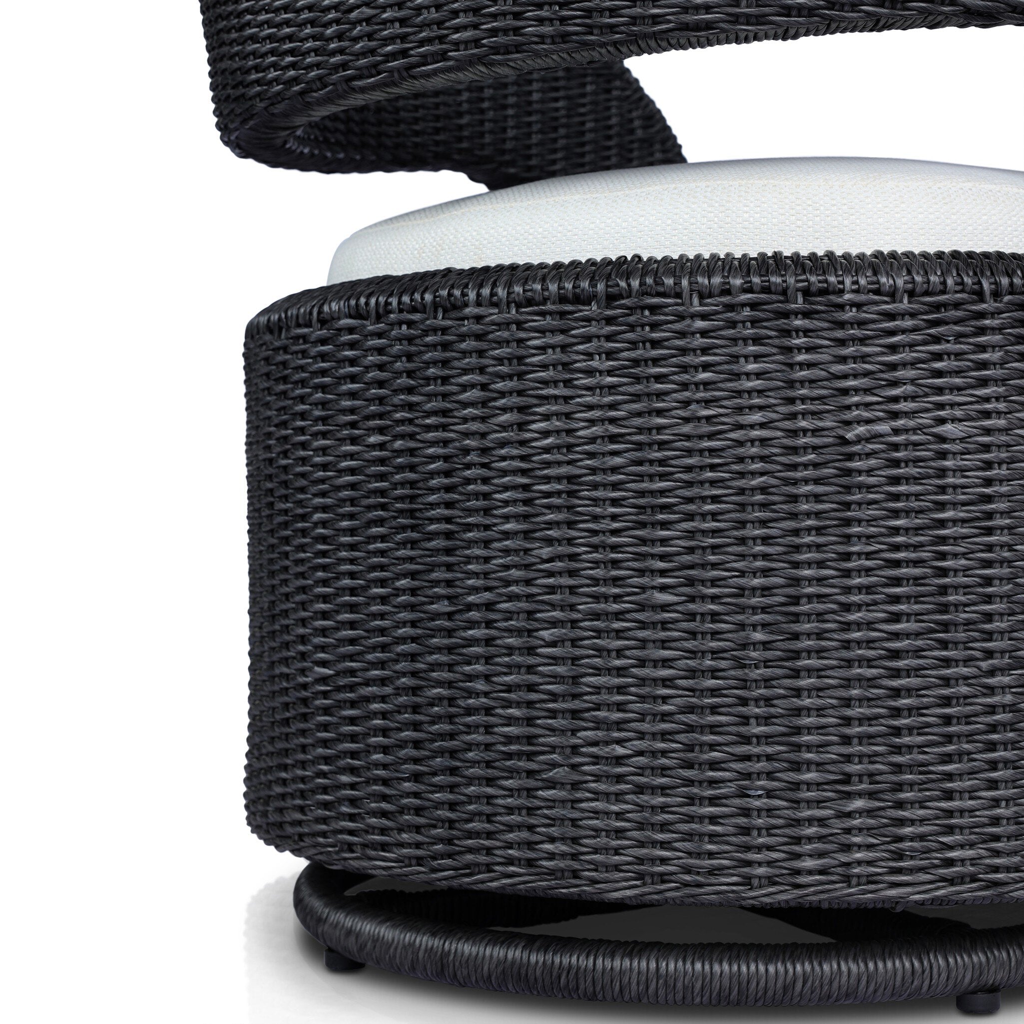 Wicker detail Hawkins Outdoor Swivel Chair in Faye Cream with a woven barrel-back and 360-degree base