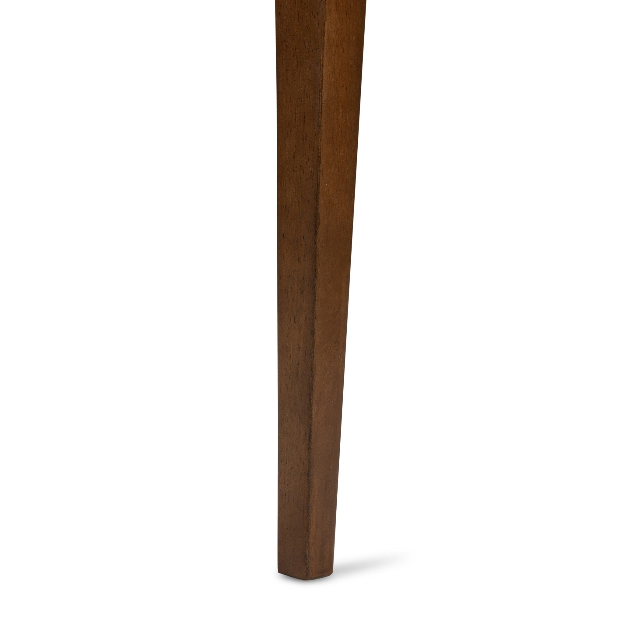 Armless dining chair solid wood leg close-up with tapered profile