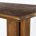 Wooden corner Erie Bar Table in Smoked Oak with a chunky pedestal base and modern rustic design