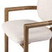 Wooden detailing Madeira three-legged dining chair featuring a tubular frame and a curved barrel backrest in cream upholstery