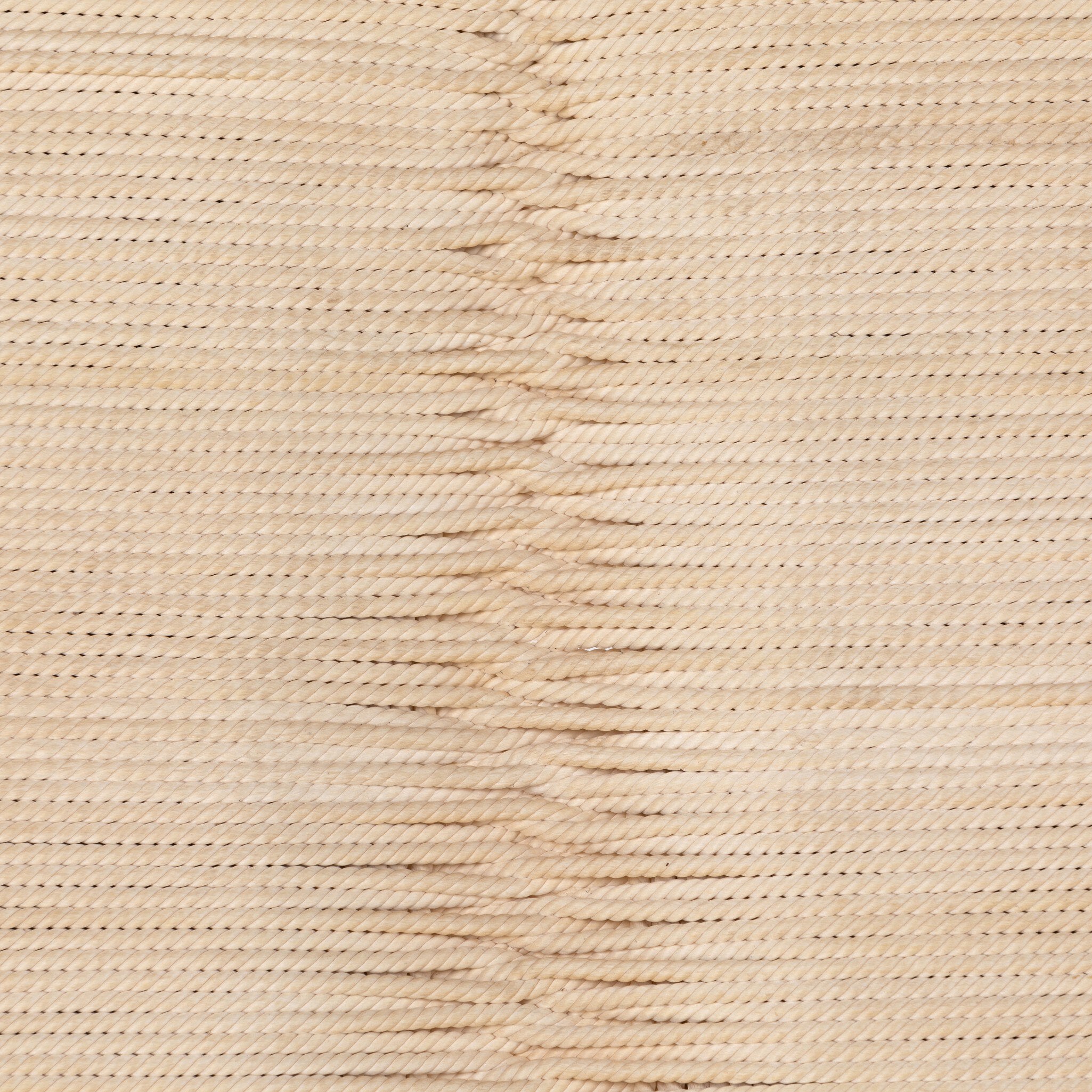 Close-up of beige woven fabric texture
