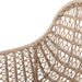 Woven detail Modern low-armed outdoor dining chair with white wicker weaving and a bronze industrial frame for hospitality