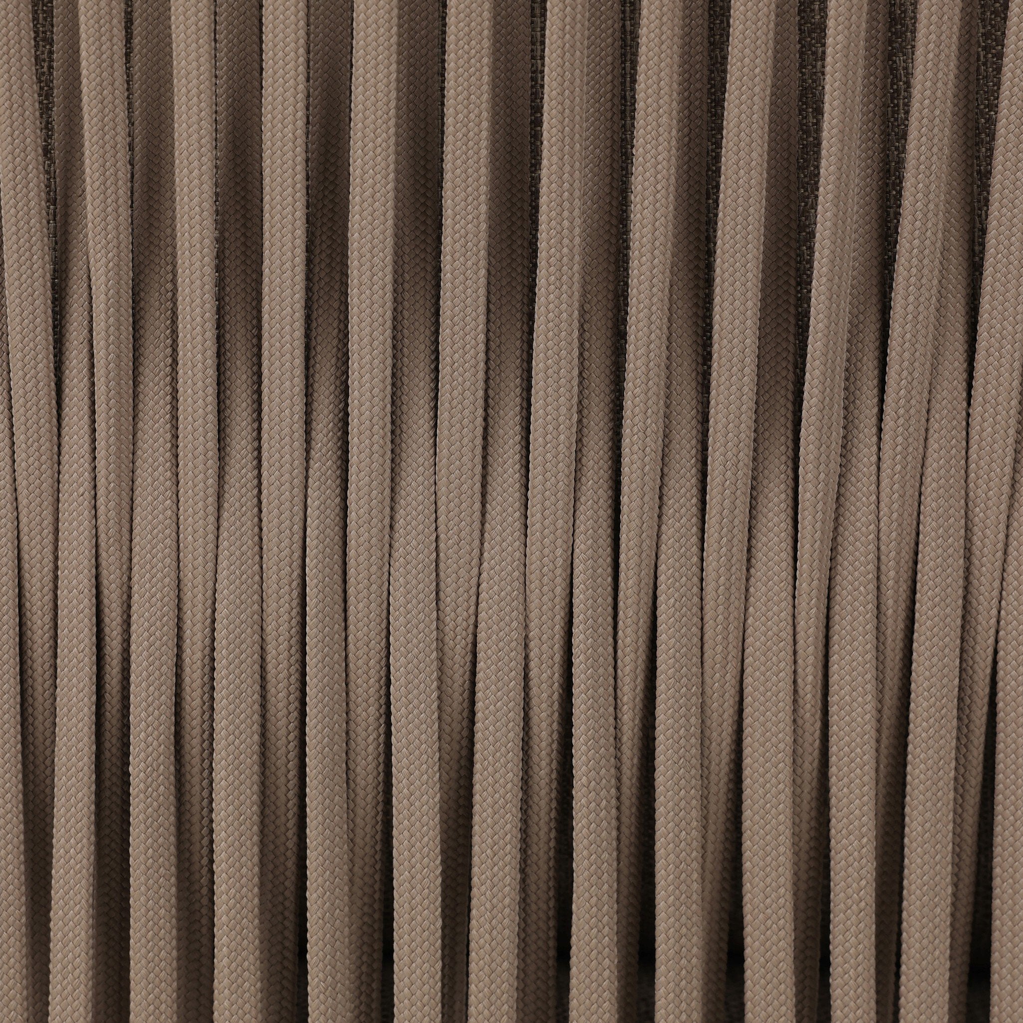 Woven detail Porto Outdoor Dining Chair with a natural teak frame and weather-resistant brown rope-weave backrest