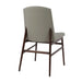 Upholstered side chair with light gray back and seat, dark brown wood base