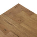 Corner detail of Abaso accent bench showing thick oak veneer and dovetail joinery construction.