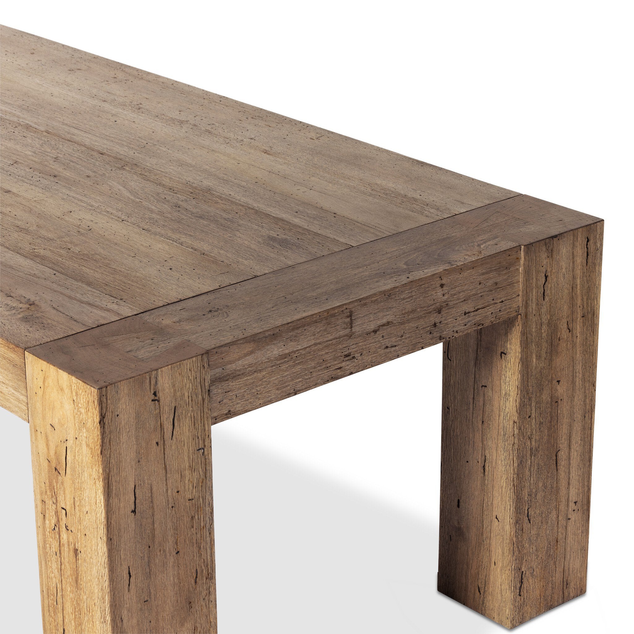 Corner detail of Abaso dining table showing dovetail joinery and thick oak veneer construction.