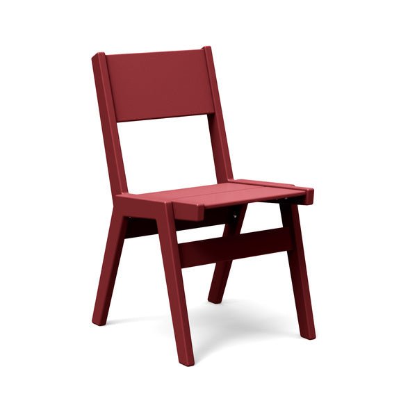 Alfresco dining chair in chili red, bold stackable outdoor chair for dramatic patio styling.