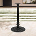 Black cast table base with tall pedestal column and ornate round base plate