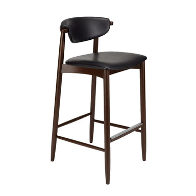 Bar stool with black upholstered seat and back, dark wood legs, built-in footrest