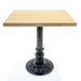 Black cast table base with fluted pedestal and ornate round base plate