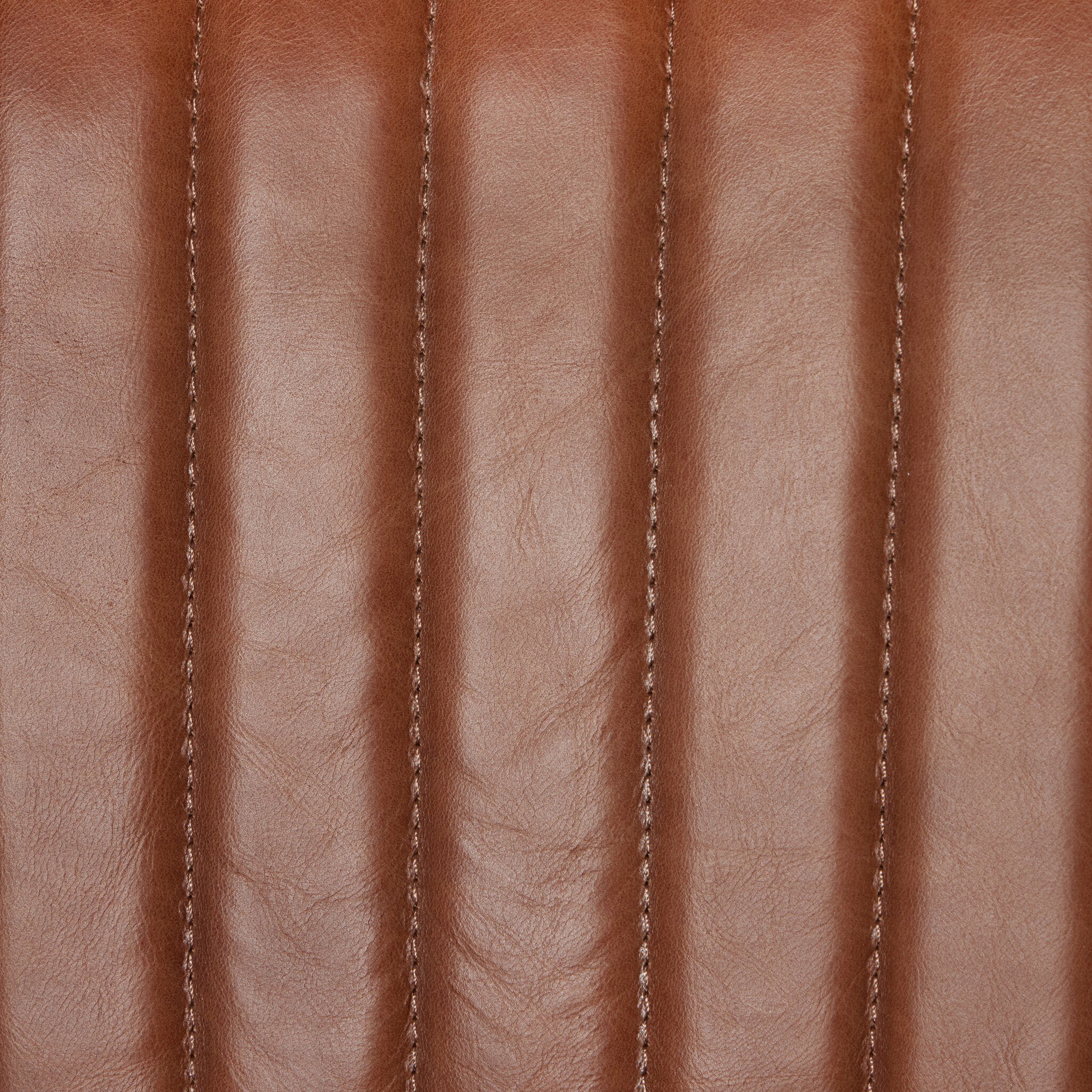 Brown leather-look upholstery with vertical channel stitching detail on the back