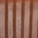 Brown leather-look upholstery with vertical channel stitching detail on the back