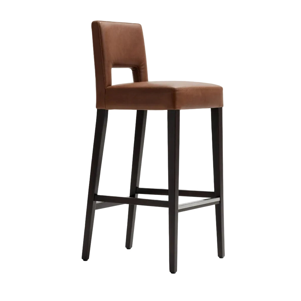 Brown leather bar stool with tall backrest and dark wood legs, footrest ring.