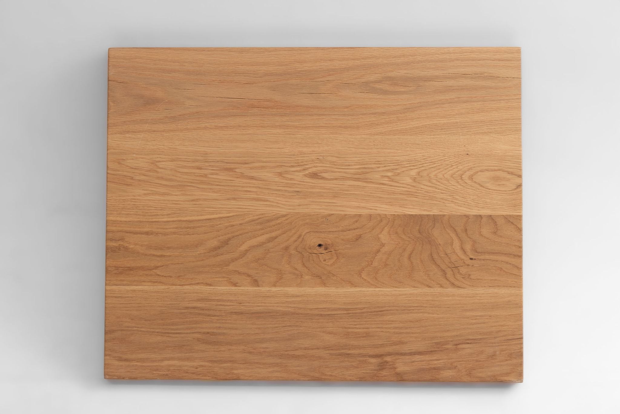 Rectangular white oak table top with natural grain and uniform finish