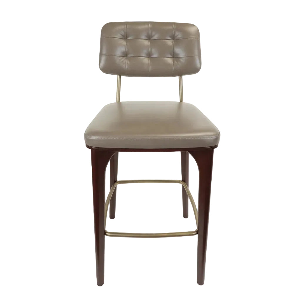 Upholstered bar stool with tufted back and beige seat, dark wood legs, gold underframe.
