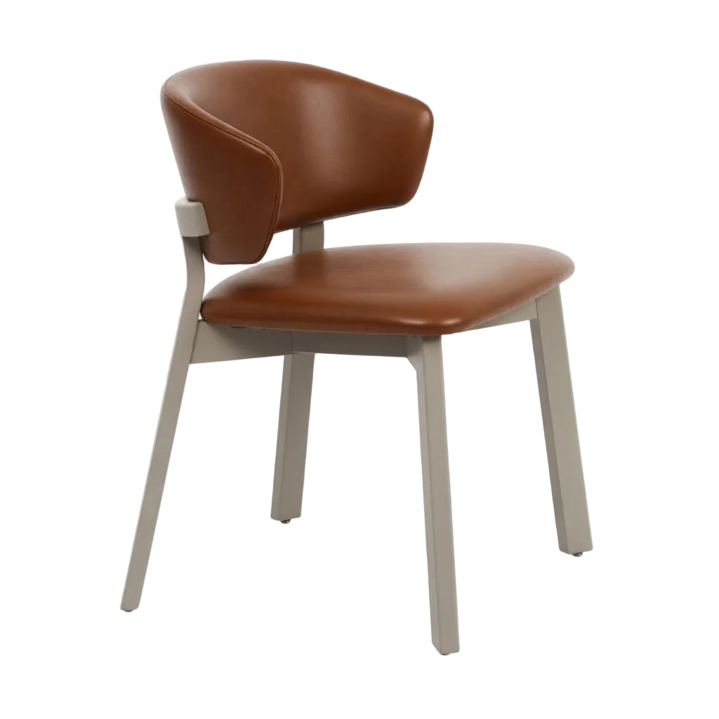 Editor side chair with brown upholstered seat and backrest, white angled legs