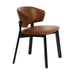 Editor side chair with brown upholstered seat and backrest, black angled legs