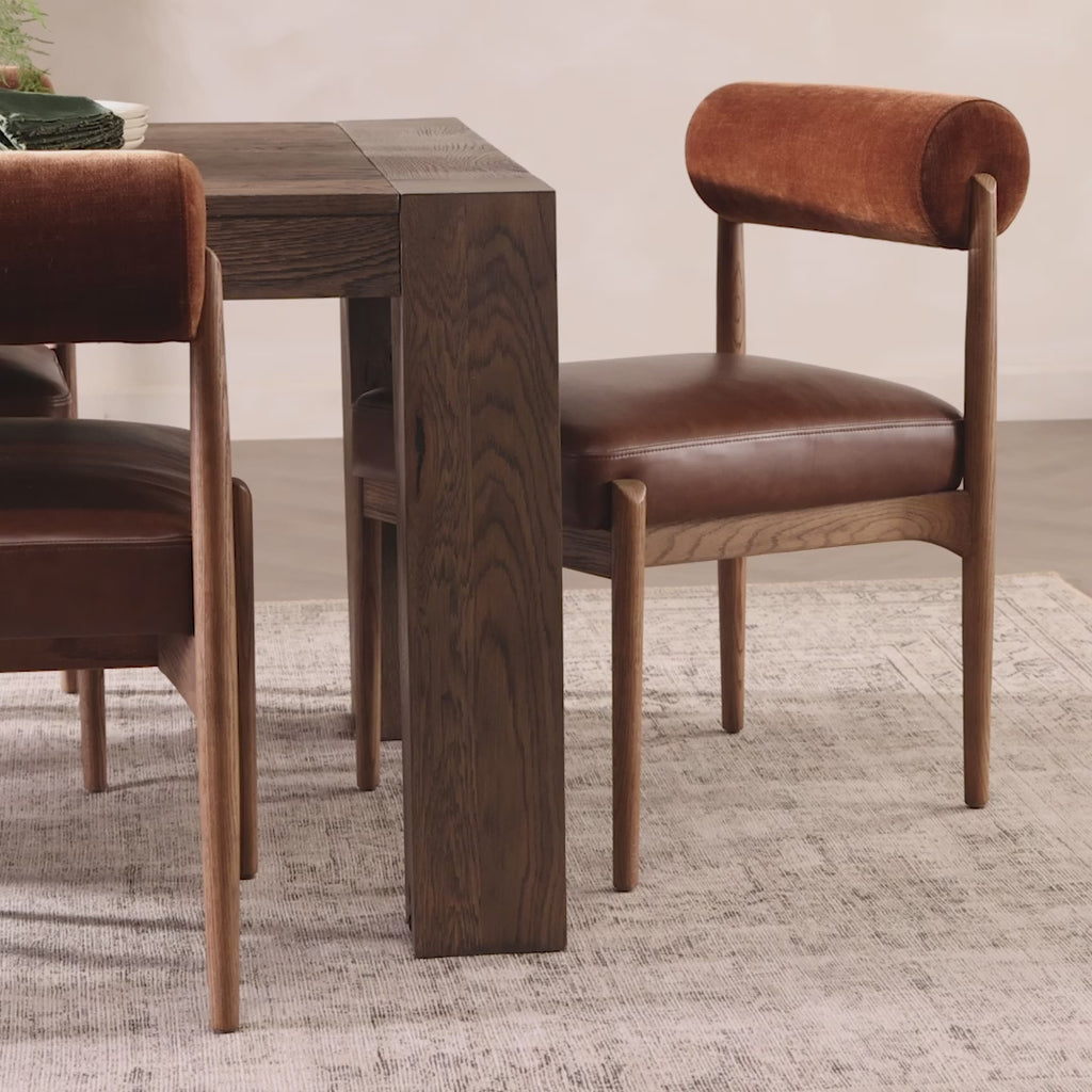 Jazelle Armless Dining Chair Shearling Bolster Back and Oak Wood Frame with Brown Leather Seating Design Idea Retro Mid Century Modern Angle View Hospitality Video Social Design Supply in Dining Scene