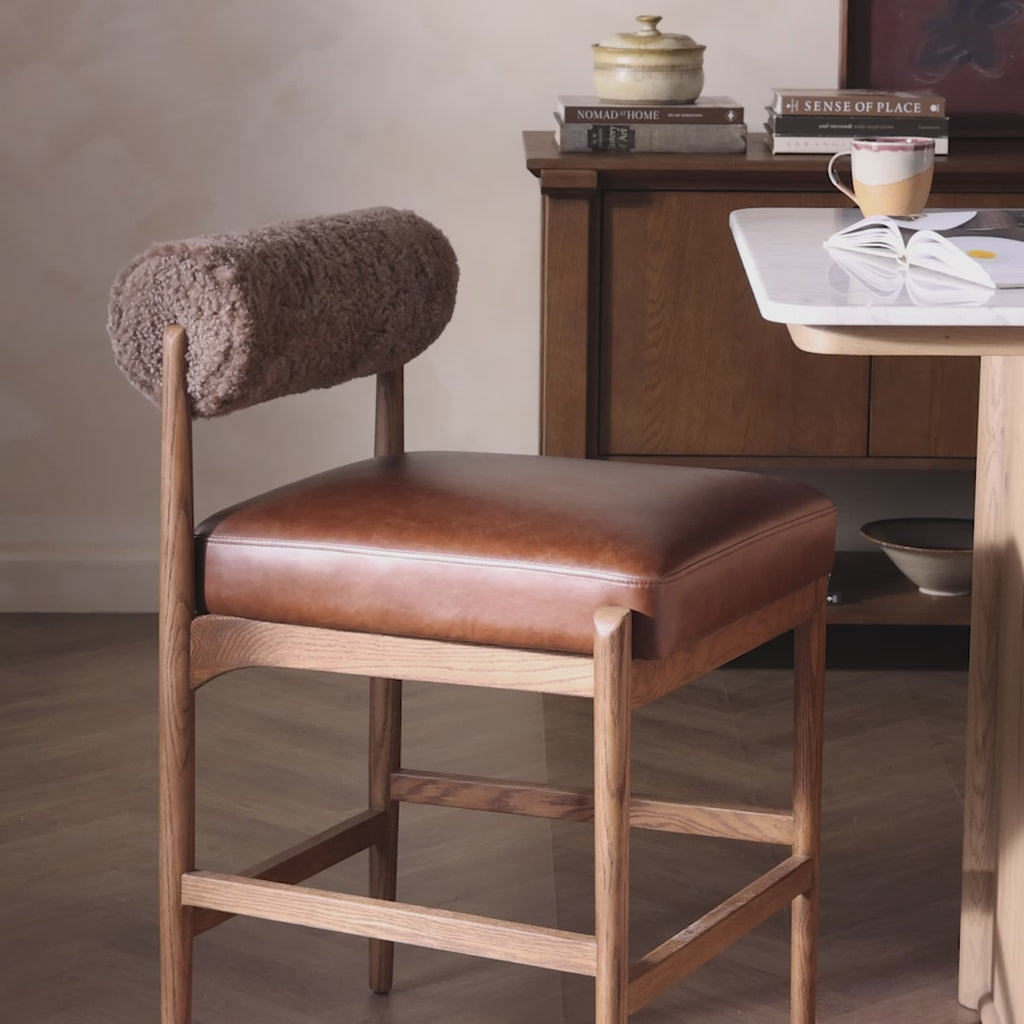 Jazelle Armless Bar Counter Stool Shearling Bolster Back and Oak Wood Frame with Brown Leather Seating Design Idea Retro Mid Century Modern Angle View Design Video Social Design Studio