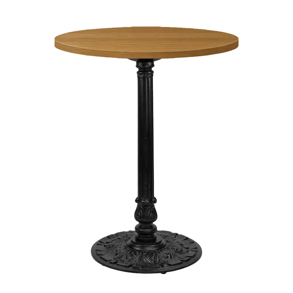 Black cast table base with round decorative foot supporting a light wood tabletop