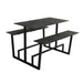Monterey table with dark concrete top and black metal base, with two side benches.