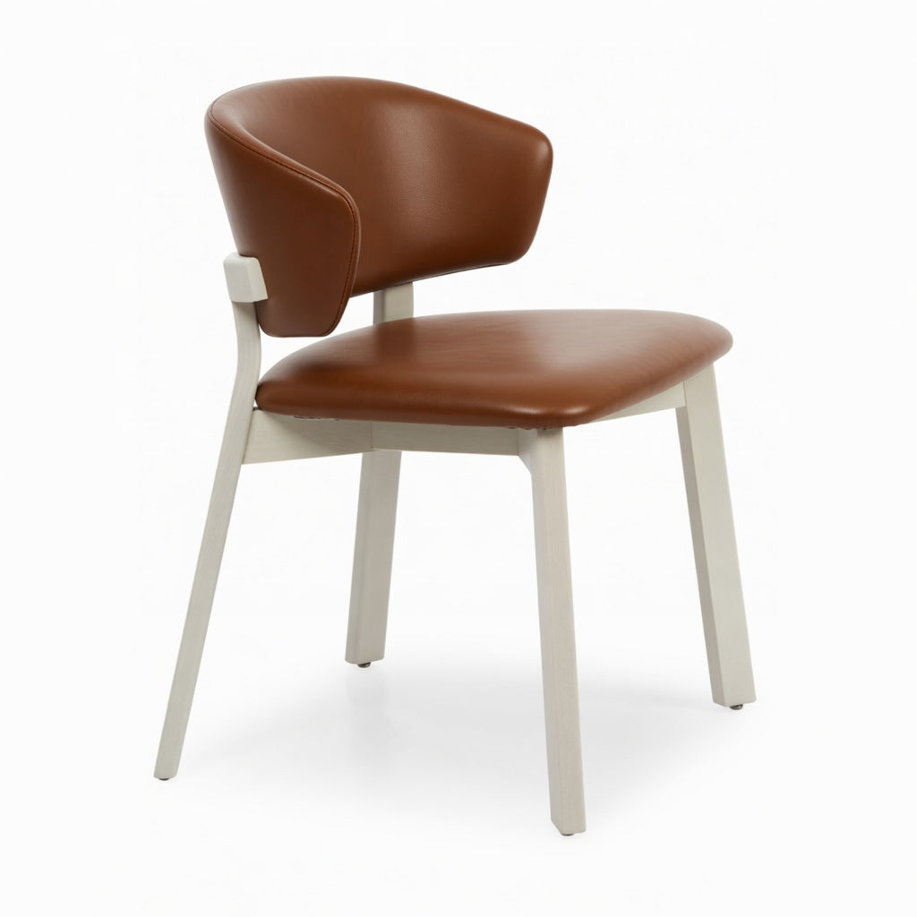 Editor side chair with brown upholstered seat and backrest, white angled legs