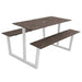 Double-top table with white metal frame and two long rectangular tops in concrete gray.