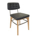 Dark gray upholstered side chair with tufted back and natural wood base
