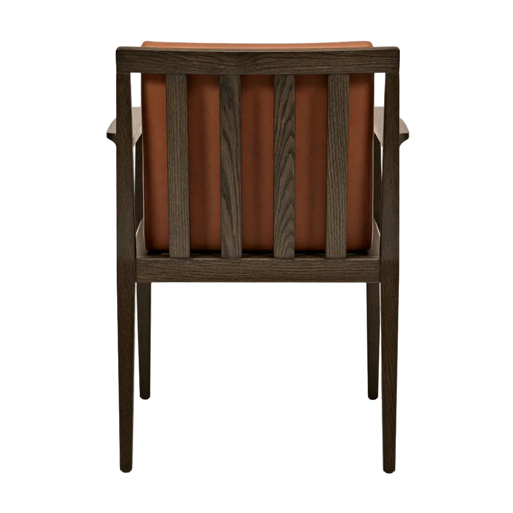 Orange leather arm chair with dark wood slatted sides and cushioned back